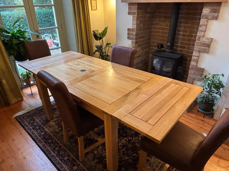 image for Oak extendable Table with four dark brown suede chairs