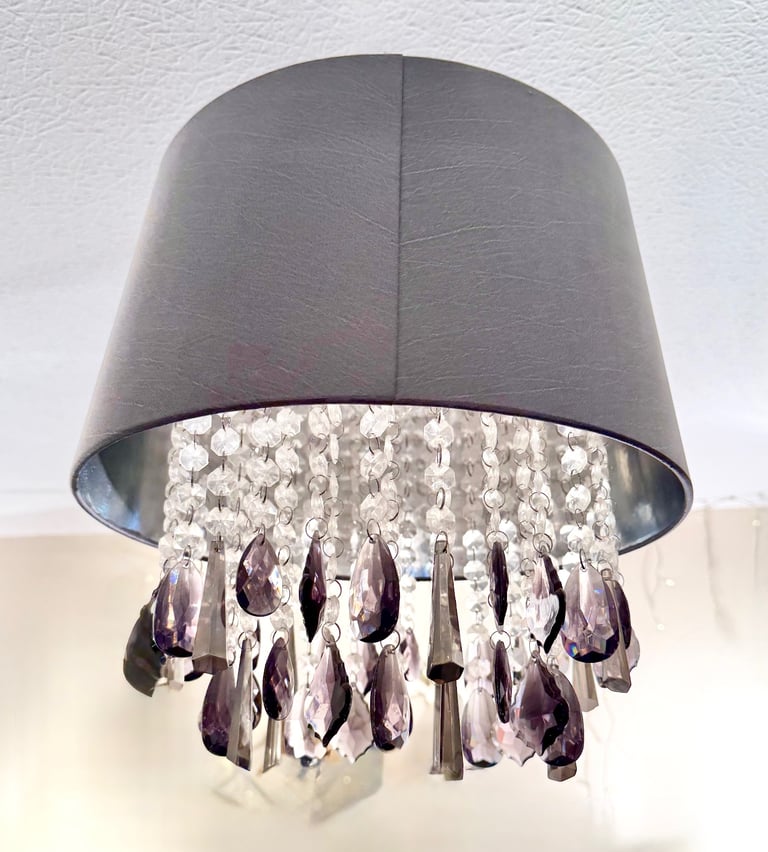 Grey pleated satin shade with drop cristals Measuring 35x 35 cm. Drop crystal plastic 