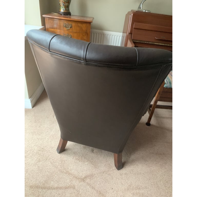 Superb brown leather club chair button back with castors 