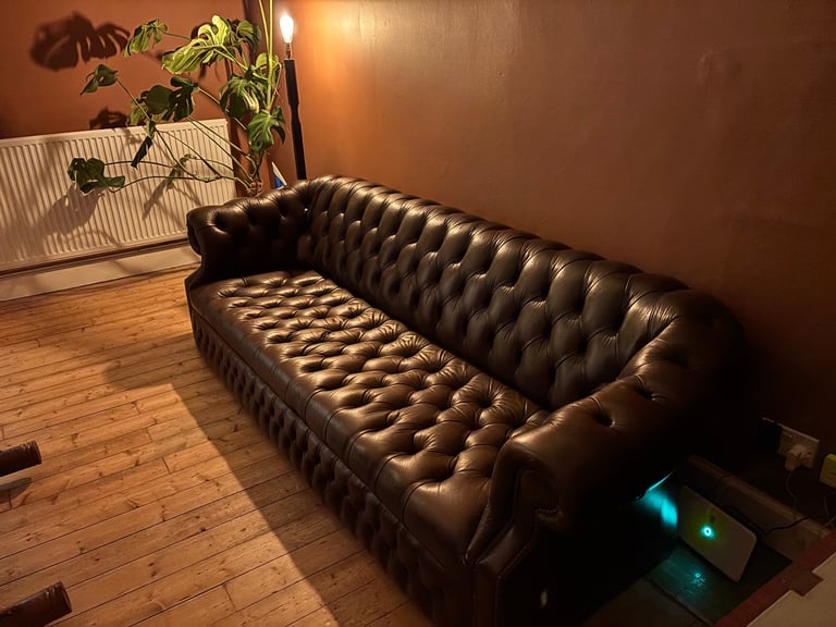 Brown leather chesterfield 