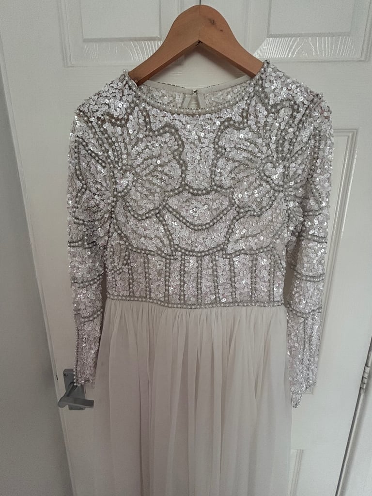 Beautiful embellished Coast bridal dress