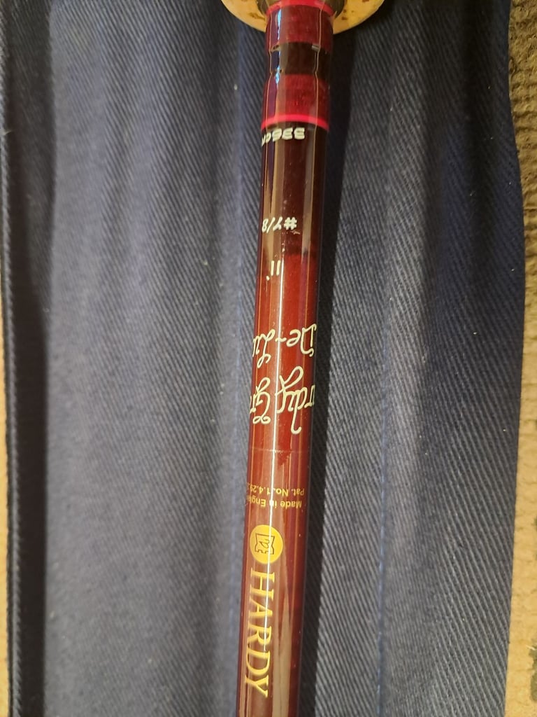 A Hardy 11ft DeLux Fly fishing rod
