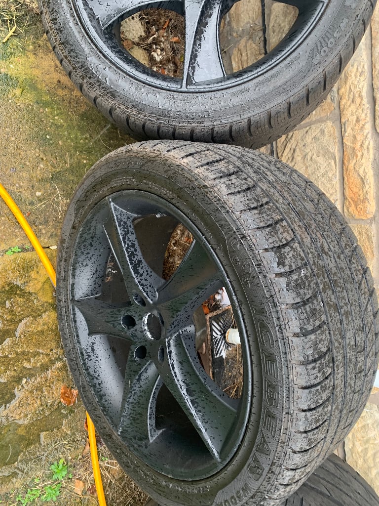 4 Black alloys with winter tyres for BMW X6 or similar