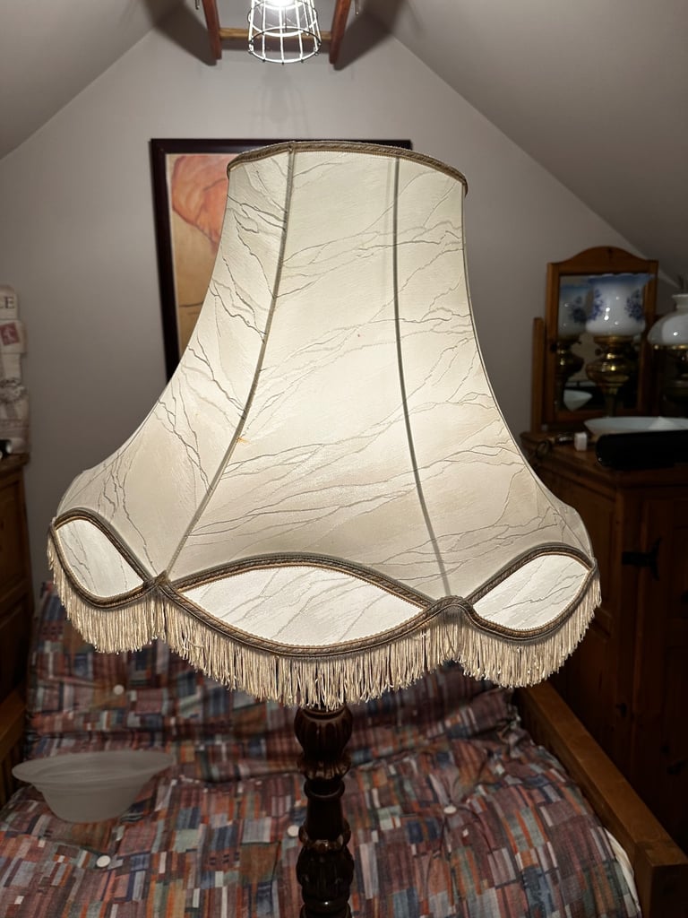 Old vintage standing lamp with lampshade 