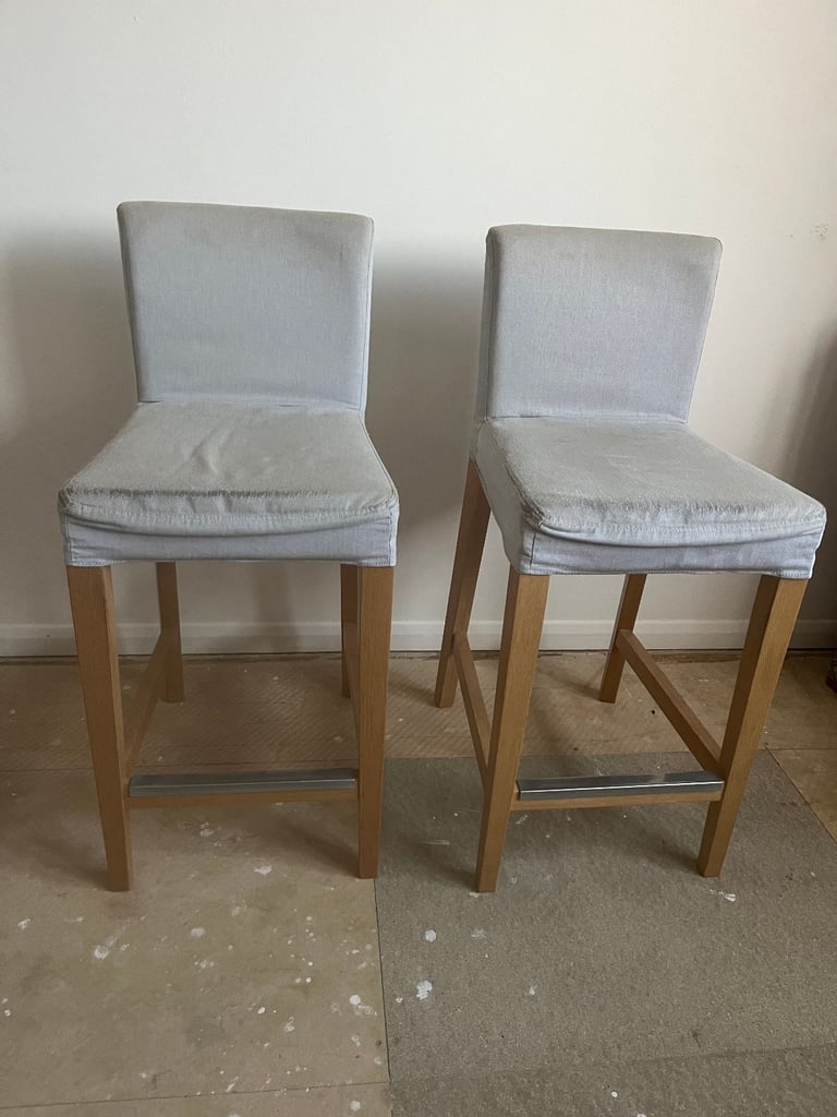 2 IKEA Bergmund Oak Bar Stools with removable covers