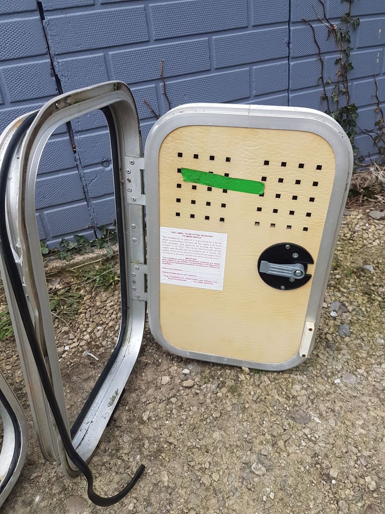 Various side doors with frames and keys for caravan camper motorhome - gas, toilet, storage.