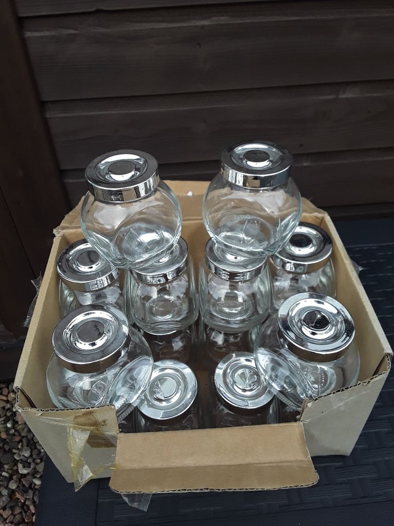 image for 16 SMALL GLASS JARS 