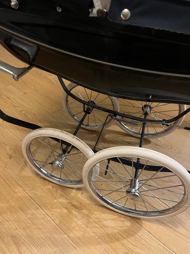 Children’s silver cross pram