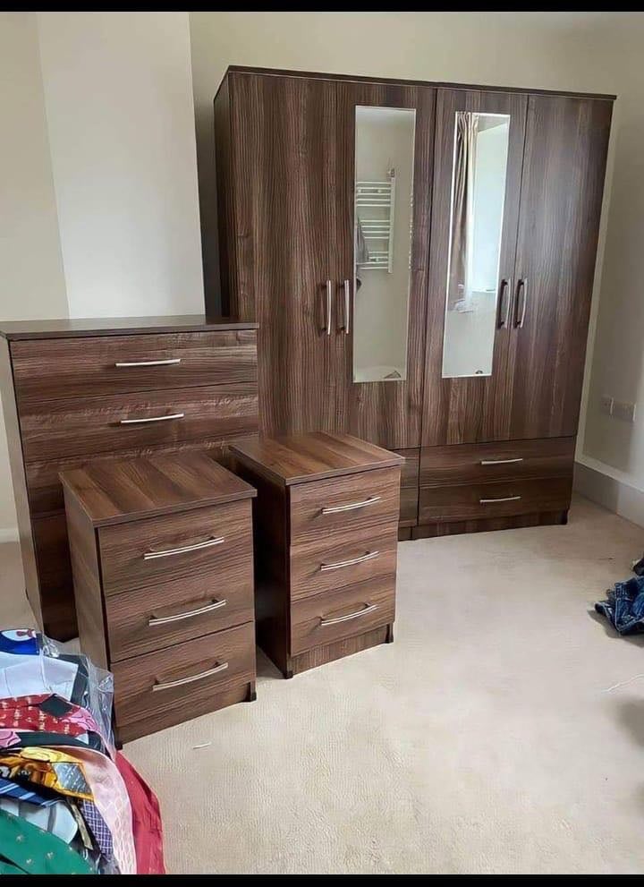 Modern Bedroom Furniture. Bedroom Suit Includes Bedside Tables, Chest of Drawers and Wardrobes
