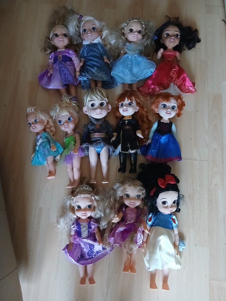Large bundle disney dolls 