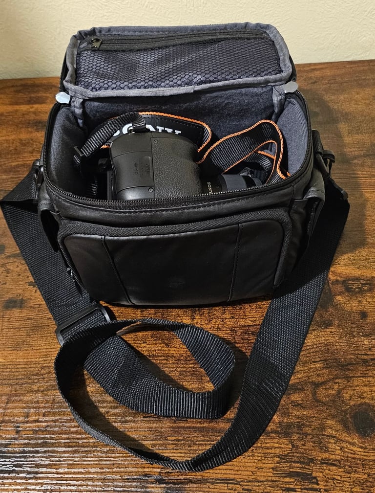 Sony Alpha 58 digital camera with 4GB SD card + 35-700mm zoom lens