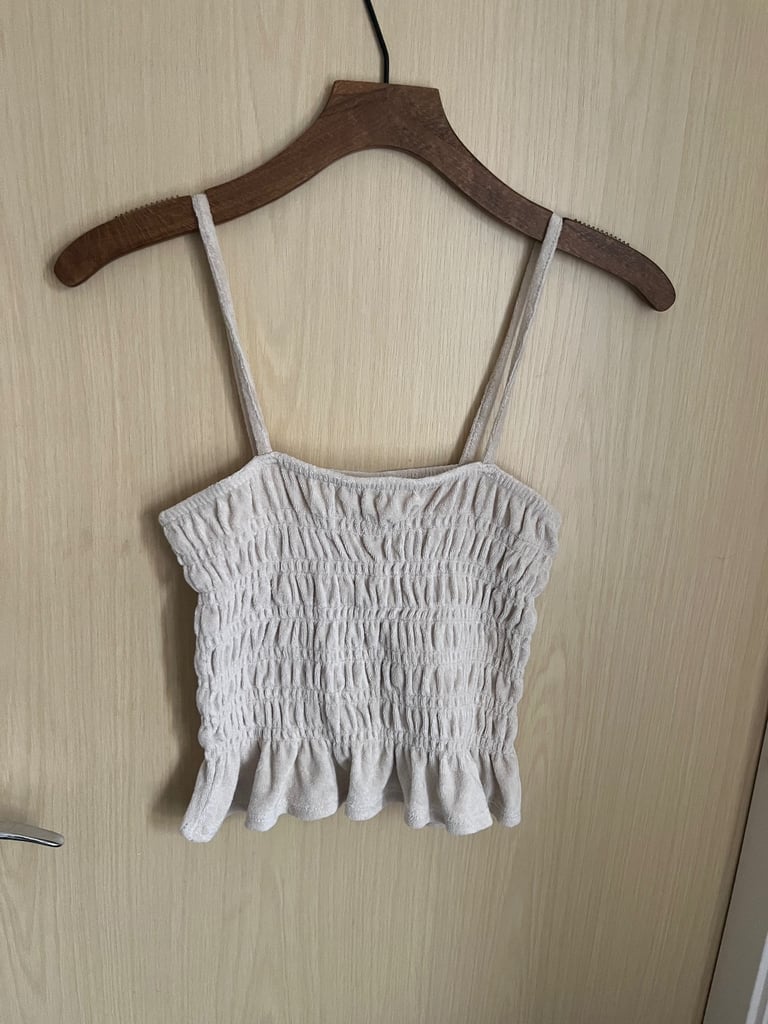 LADIES H&M tBEIGE SMOCKED CROP TOP IN SOFT JERSEY. NARROW TIE TOP SHOULDER STRAP SIZE S