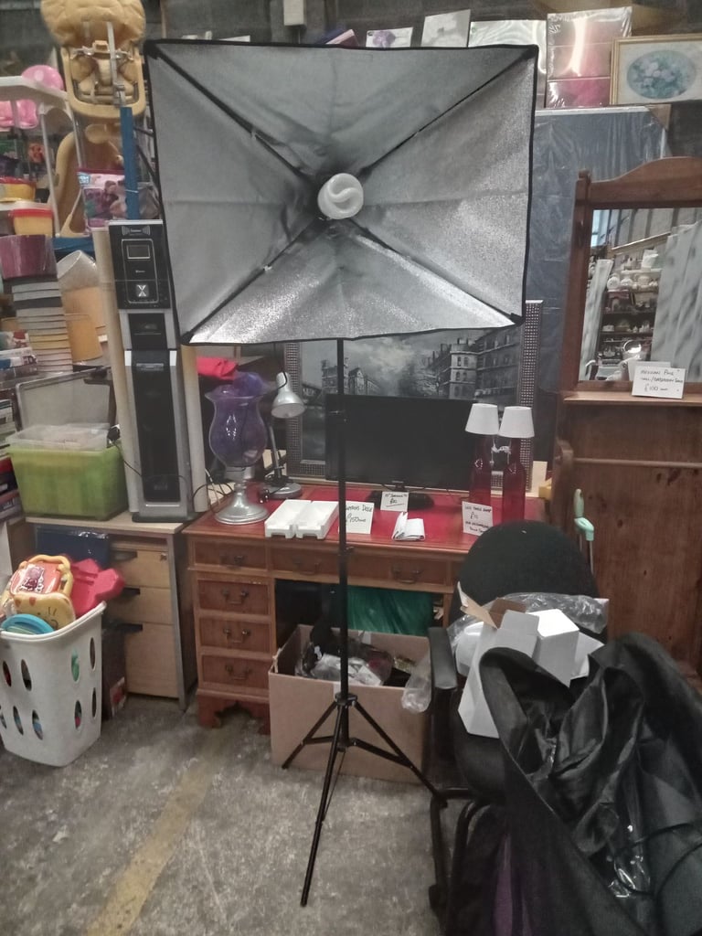 Pair of photographers lighting etc