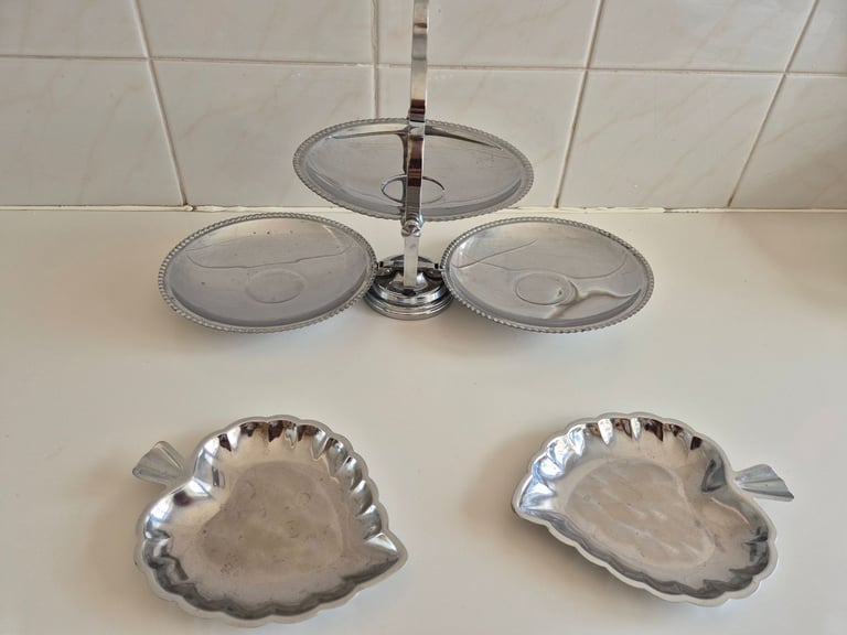 Folding Cake stand, chrome/tin. with 2 leaf shaped serving dishes. £10.00. lincoln