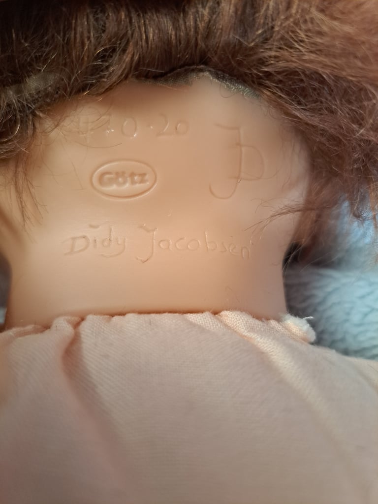 Collectable baby dolls and antique style pram