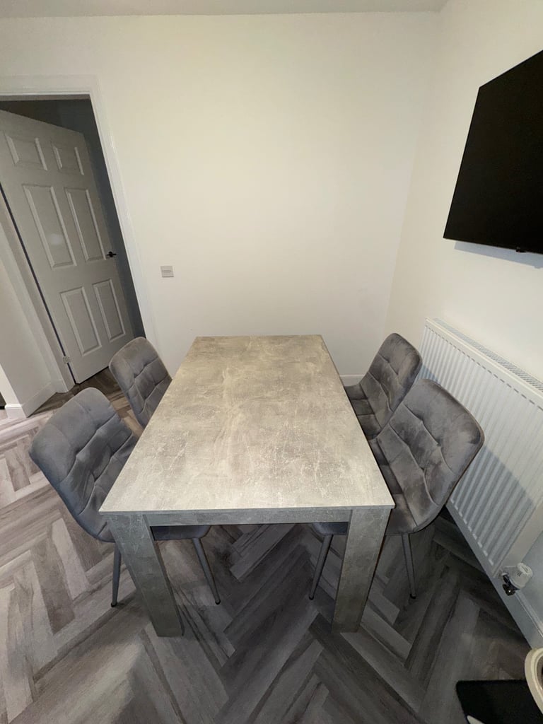 Grey dining table & 4 chairs 