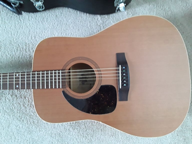 Left handed Norman B18 acoustic guitar, made in canada.