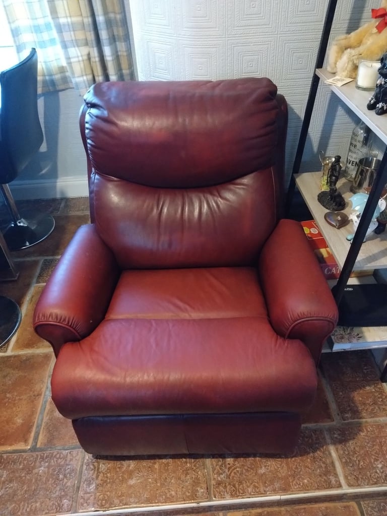 Red leather reclaims sofa and armchair