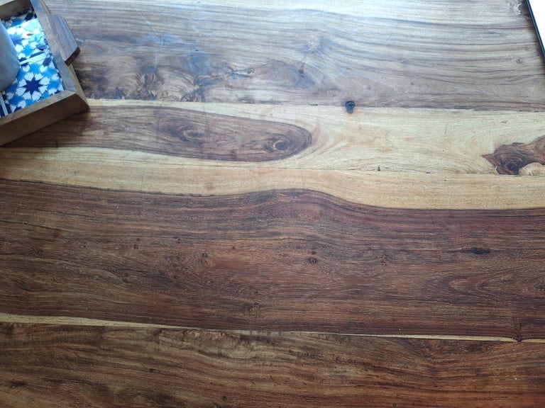 High quality natural tropical hardwood dining room table and chairs.