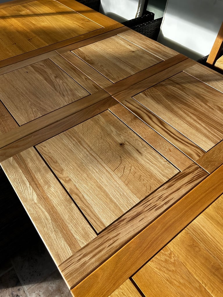 Solid oak dining table and six chairs