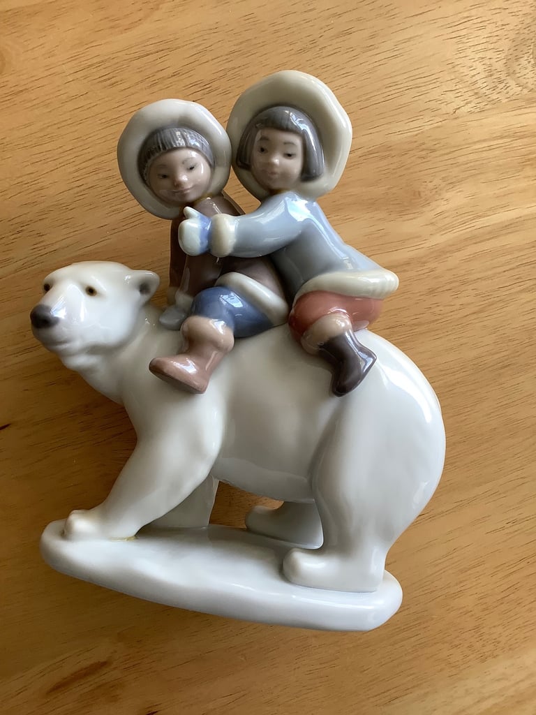 image for Lladro Eskimo children riders on polar bear