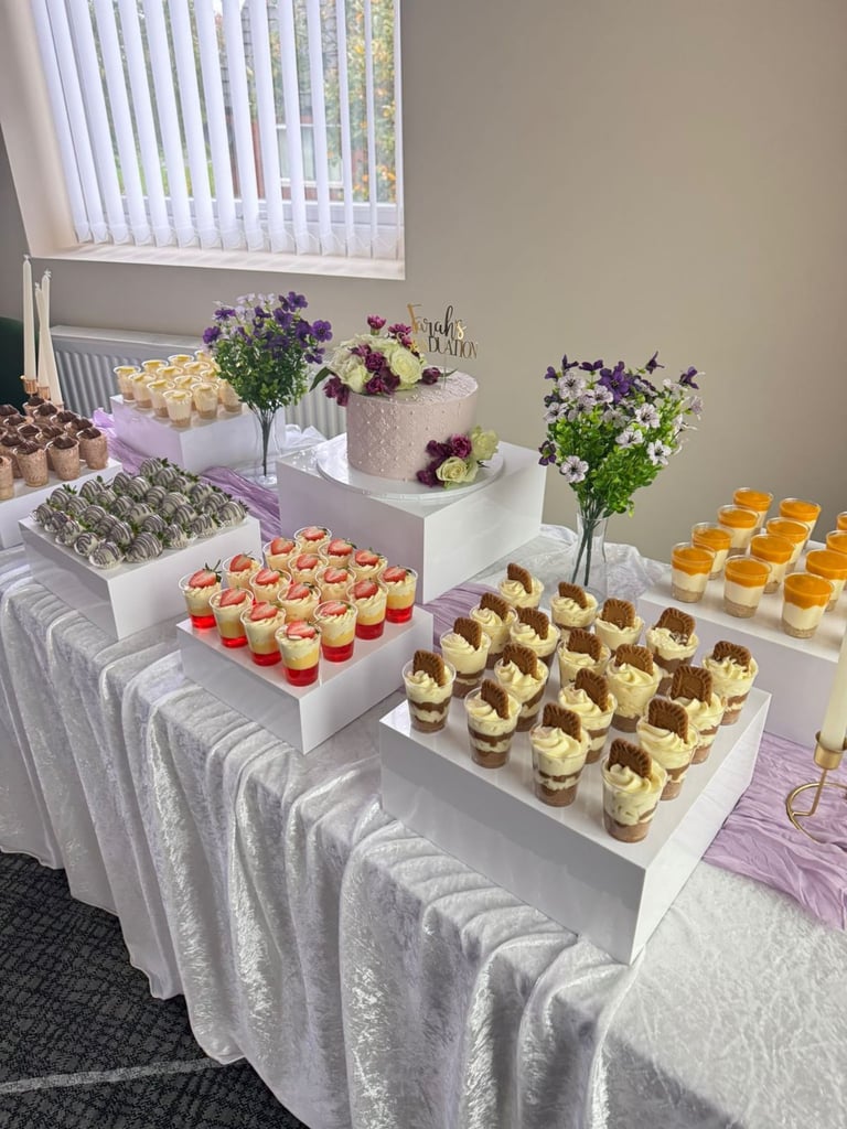 Party event balloon backdrop for hire and desserts 