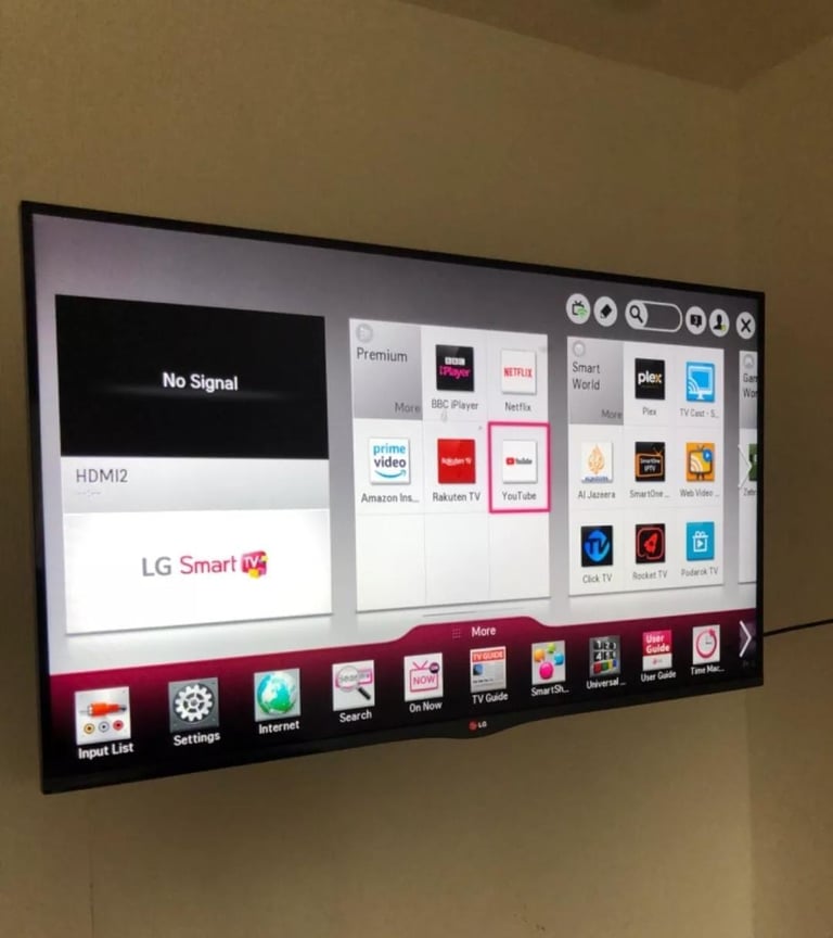47 inch LG tv with brand news android stick and remote.
