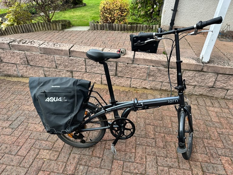 Tern folding bicycle with frame and pannier