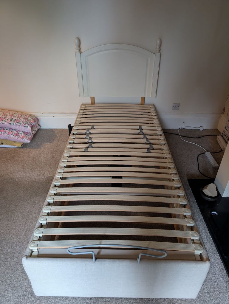 Velda Single Electric Bed with headboard, mattress and topper.