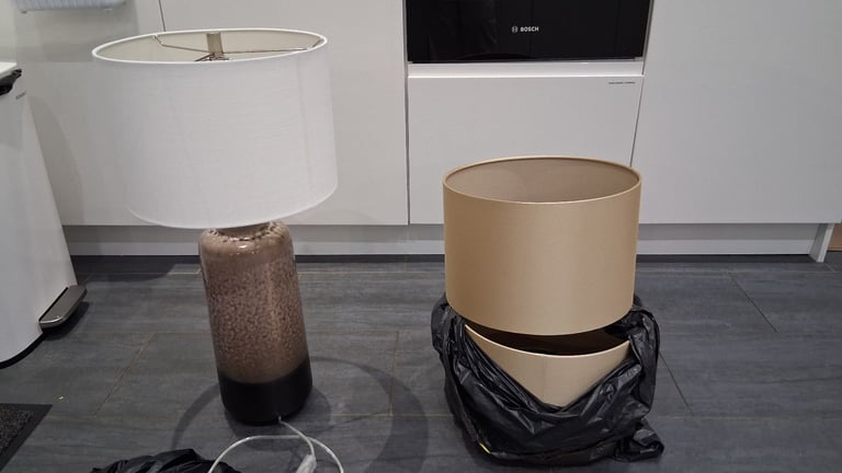 Quality lamp with white shade and 2 cream golden shades.  Almost new