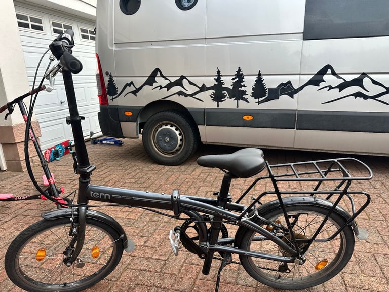 Tern folding bicycle with frame and pannier