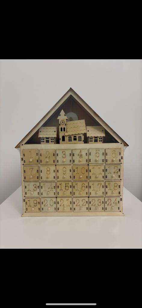 24 Day Wooden Advent Calendar with Light Up Christmas Town, 24 Storage Drawers.