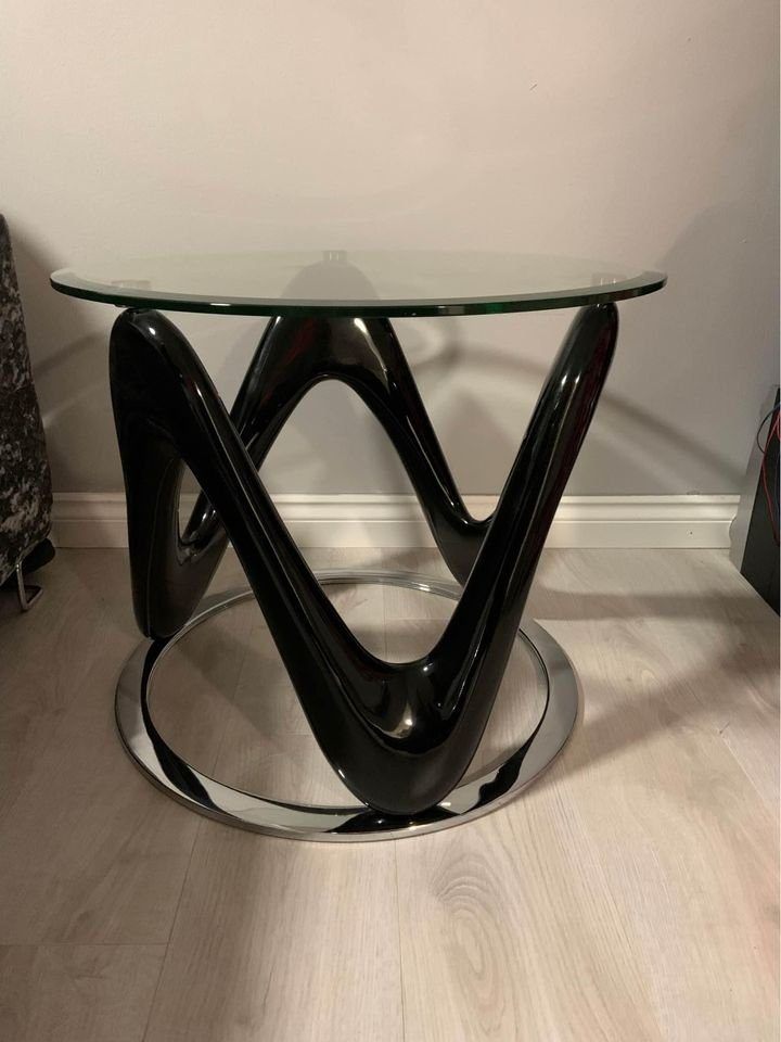Modern glass coffee / side table with gloss black feature base
