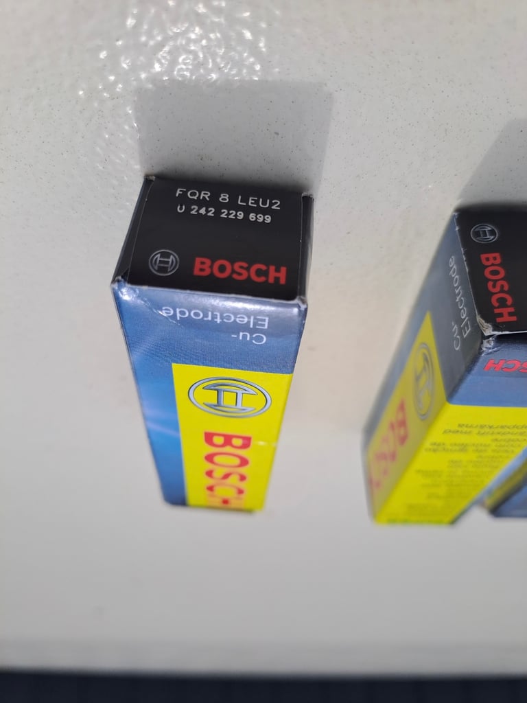 4 x Bosch spark plugs FQR 8 LEU2.  Brand new