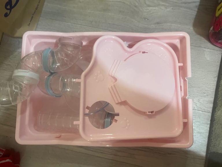 Pink hamster cage