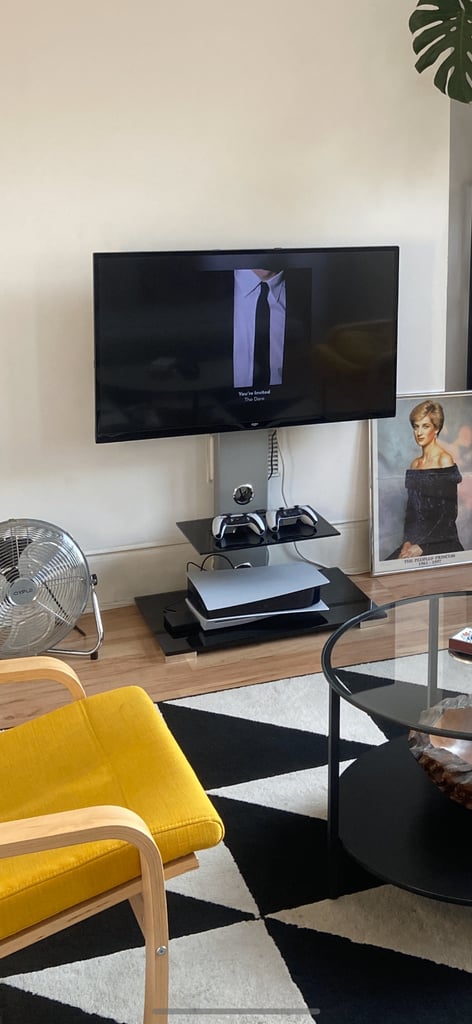 Pedestal TV stand - silver metal and black glass