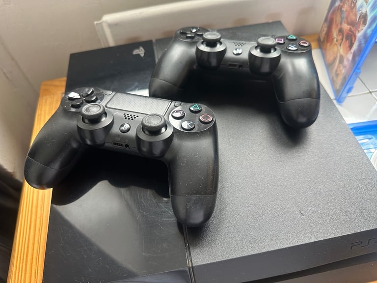 PS4 with Games + 2 controllers 