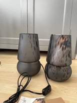 Pair of new, unused lamps