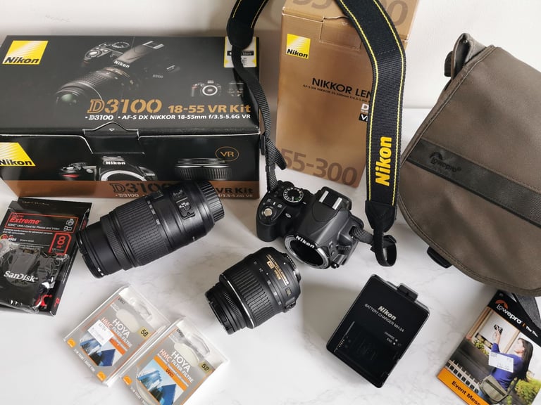 NIKON D3100 DSLR CAMERA with 18-55mm lens kit and 55-300mm zoom lens and extras