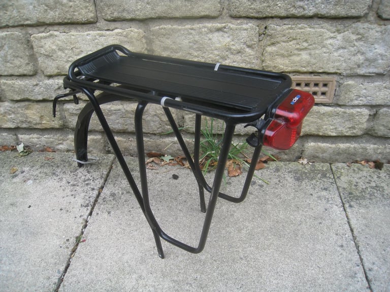 2 pannier racks £10 . tortec / led light 