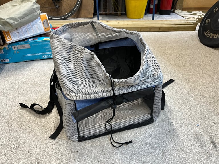 Dog carrier for bike or rucksack. 