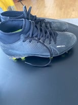 Nike moulded studs football boots.