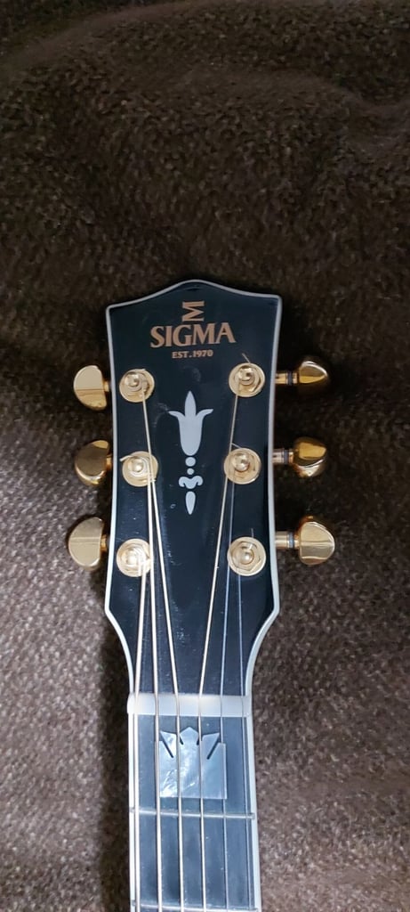 Sigma SGJA SG200 all solid wood model 