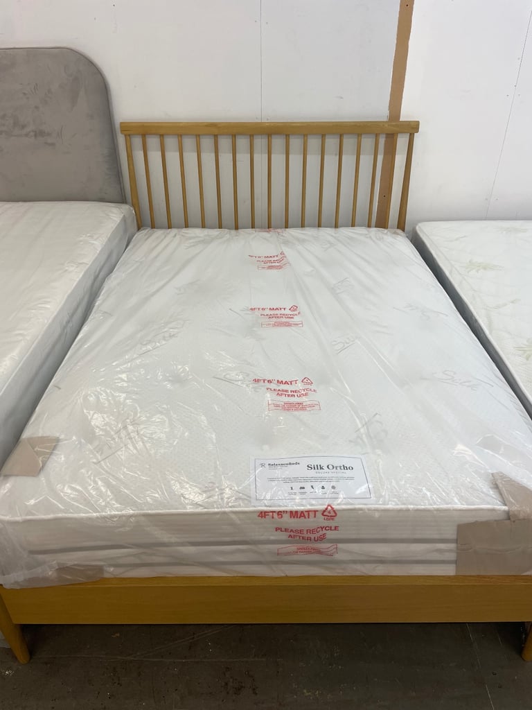 Wooden double bed with mattress 