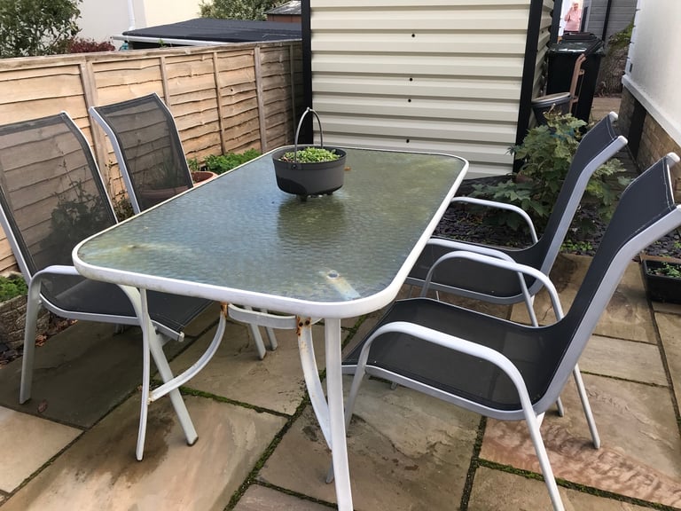 image for Glass grey patio table and four chairs