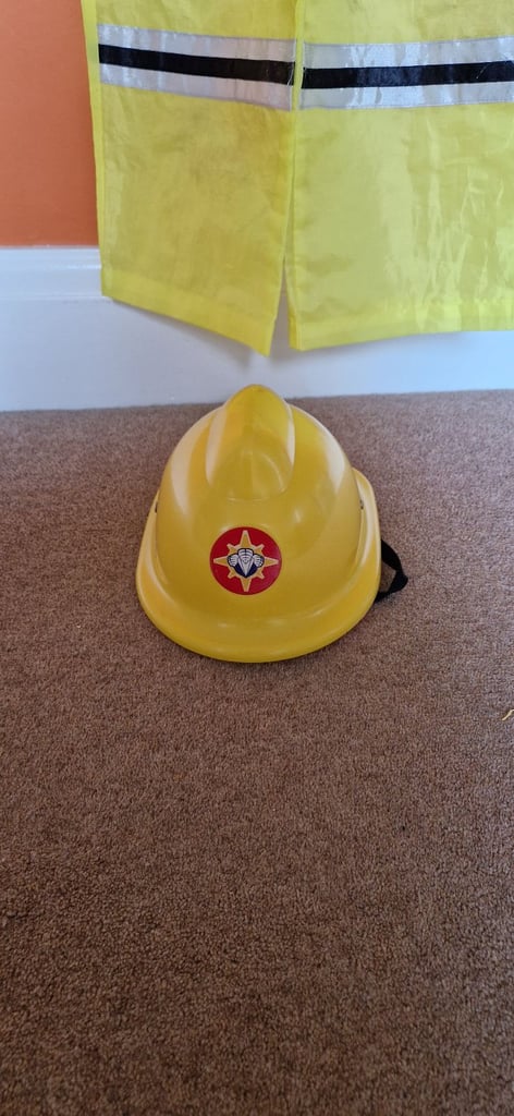 E.L.C FIREFIGHTERS DRESS UP OUTFIT WITH FIREMAN SAM HELMET. VERY GOOD.