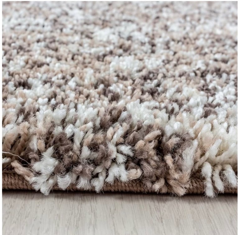Brand new multicoloured rugs.  £30 each 