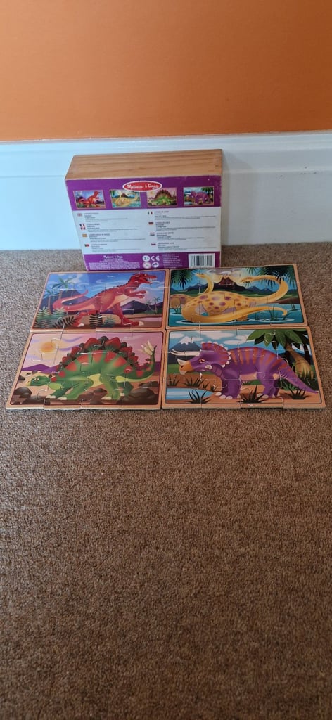 MELISSA AND DOUG 4 DINOSAUR JIGSAW PUZZLES IN BOX. EXCELLENT CONDITION.