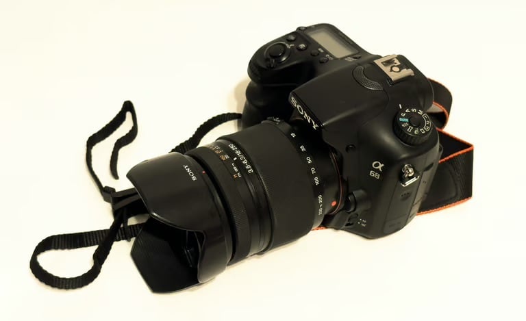 Sony Alpha SLT-A68 with 2 lenses