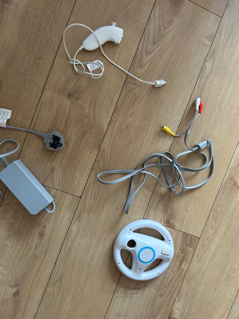 image for Nintendo wii accessories - 5 pounds each - nunchuk , power supply , av cable , steering wheel